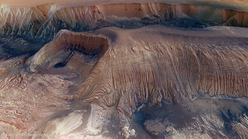 Illustration for article titled These Images Show the Brutal Scars on Mars's Surface